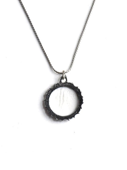 Kiyomizu-yaki Blue Floral Pendant Necklace showing the plain white back of the porcelain pendant