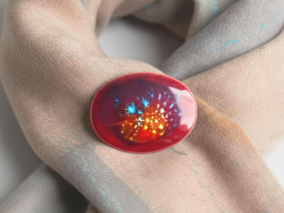 Kutani Dark Red Ceramic Brooch pinned to a soft draped scarf showing its vibrant glazed surface and gold highlights