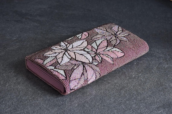 Japanese Beaded Clutch Floral Design angled view on dark surface