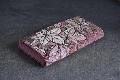 Japanese Beaded Clutch Floral Design angled view on dark surface