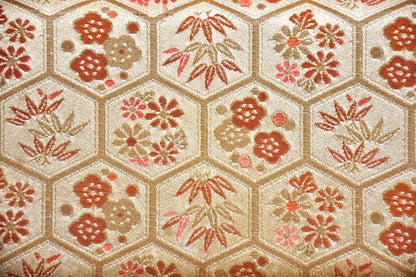 Hexagonal Floral Kimono Clutch pattern detail showing gold background and floral motifs