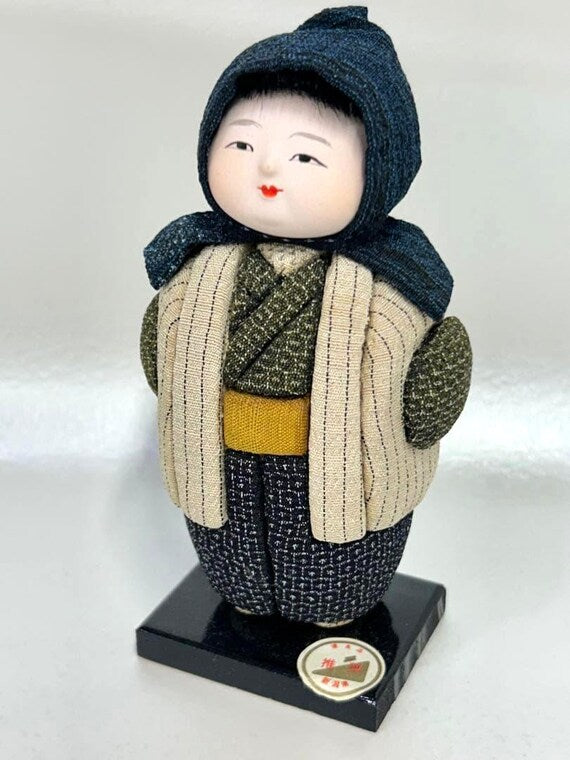 Omeshi Ningyō Doll traditional Japanese kokeshi doll front view showing handmade silk textile clothing