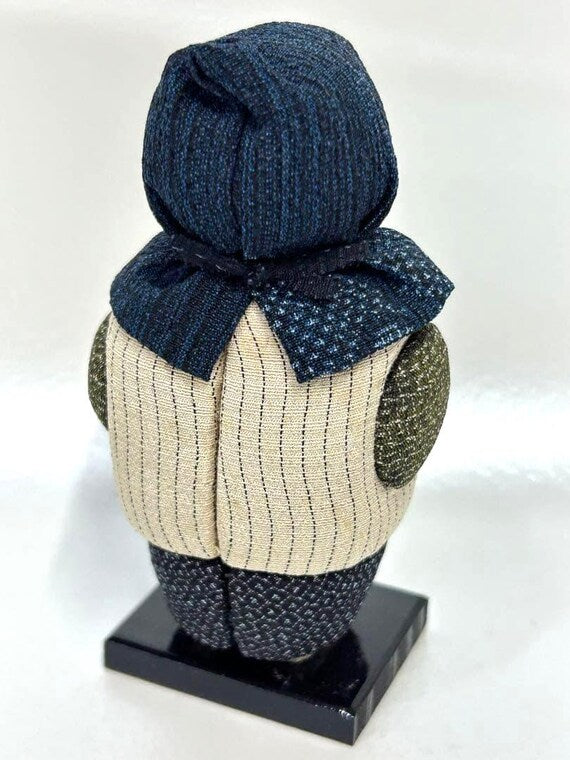 Omeshi Ningyō Doll traditional Japanese kokeshi doll back view showing blue and white patterned silk hood