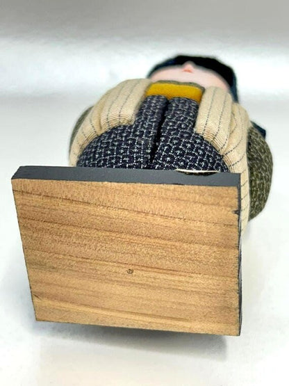 Omeshi Ningyō Doll traditional Japanese kokeshi doll bottom view of the wooden mounting base