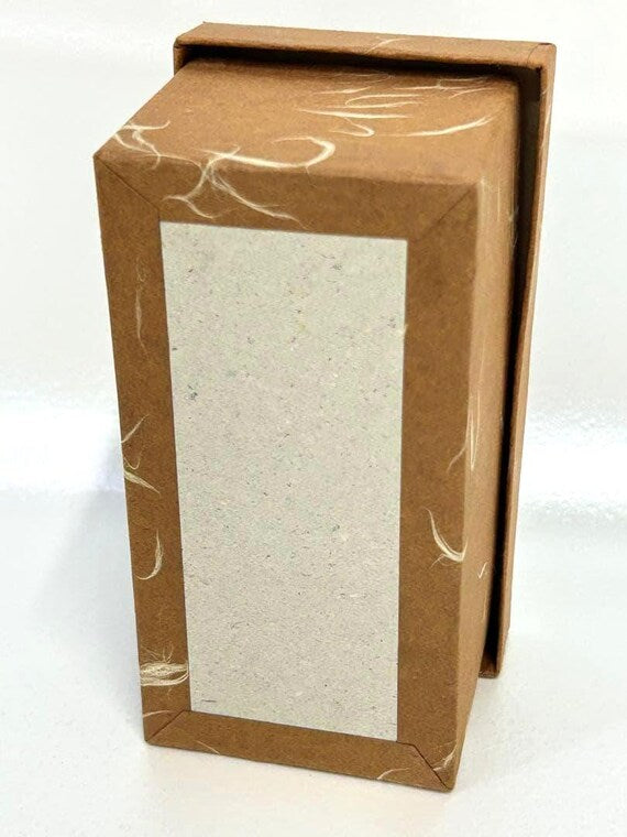 Omeshi Ningyō Doll original storage box back side made of textured brown paper