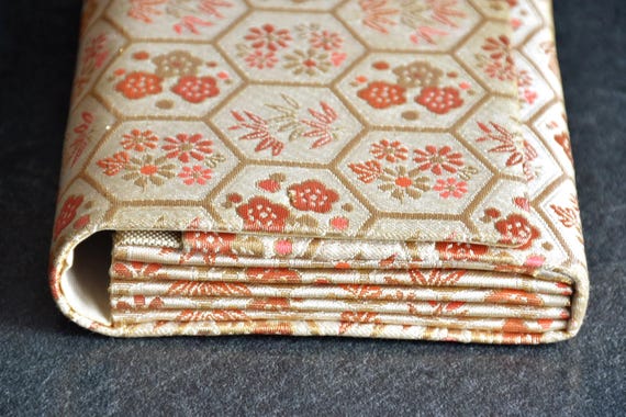Hexagonal Floral Kimono Clutch close up view of the folded side gussets