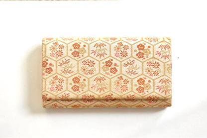 Hexagonal Floral Kimono Clutch horizontal orientation against white surface