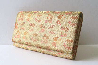 Hexagonal Floral Kimono Clutch angled view displaying the geometric textile pattern
