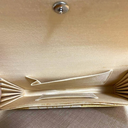 Kimono Clutch Gold Fan Pattern close up of the interior lining and snap closure