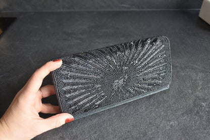 Japanese Beaded Peacock Clutch held in a hand to demonstrate its scale and size