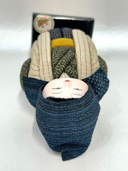 Omeshi Ningyō Doll traditional Japanese kokeshi doll top-down view showing head and upper body attire