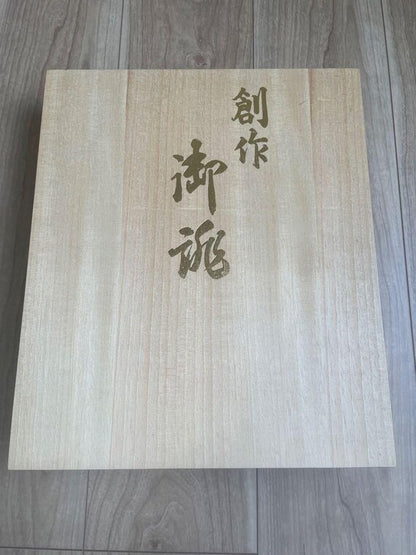Gold Brocade Zori Sandals And Clutch Set wooden storage box exterior with golden Japanese calligraphy characters