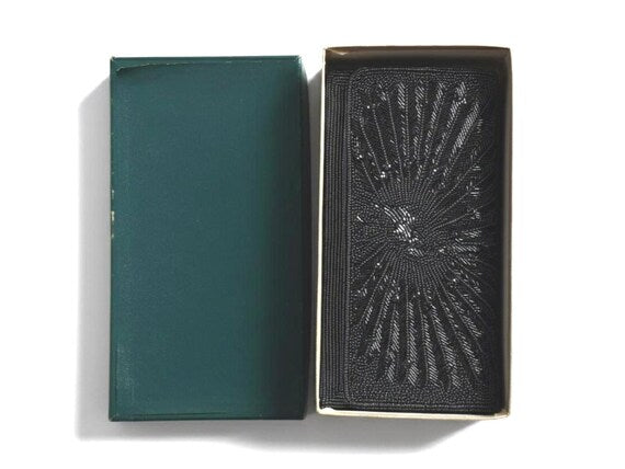 Japanese Beaded Peacock Clutch shown alongside its matching dark green storage box