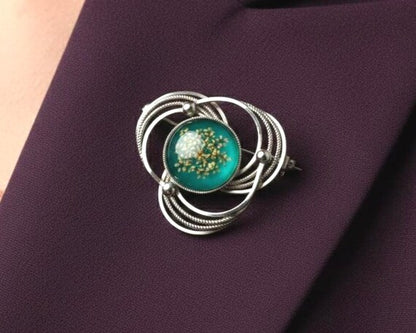Japanese Floral Brooch With Green Glass
