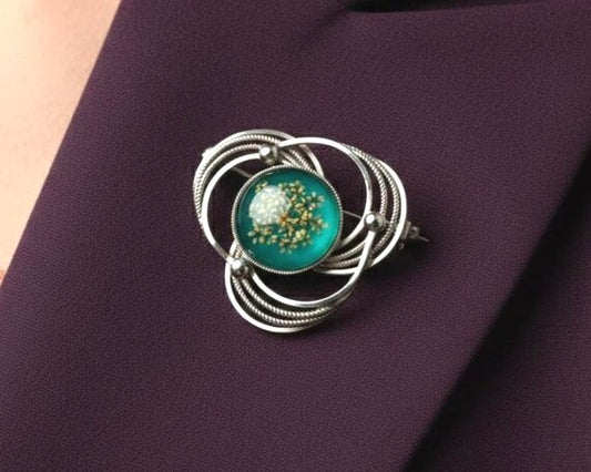 Japanese Floral Brooch With Green Glass