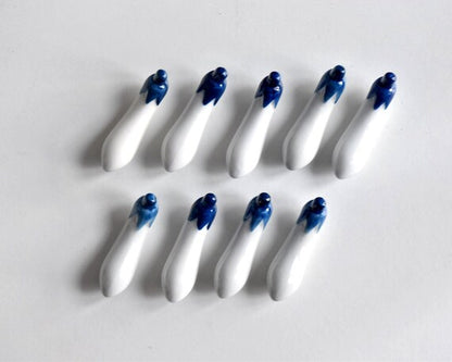 Japanese Eggplant Porcelain Chopstick Rests (Set Of 9)