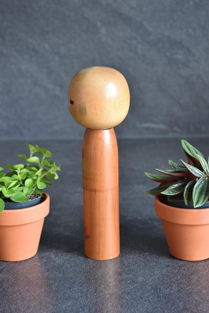 Kokeshi Doll Floral Pattern wooden Japanese figurine shown from the back view