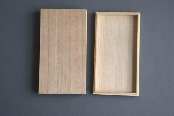 Oshima Tsumugi Kimono Bag empty paulownia wood storage box shown with lid removed