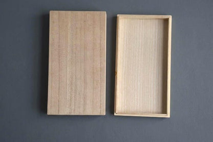 Oshima Tsumugi Kimono Bag empty paulownia wood storage box shown with lid removed