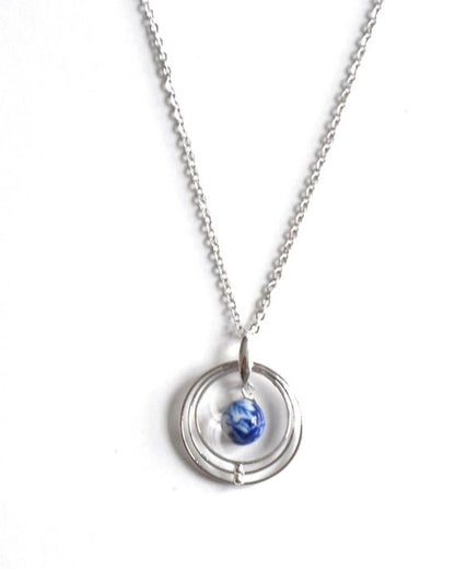 Kiyomizu-yaki Blue Floral Pendant Necklace detail view of the porcelain bead and rings