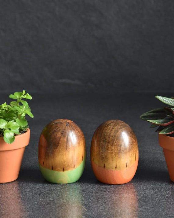 Usaburo Creative Kokeshi Pair highlighting the upper wood grain pattern and smooth form