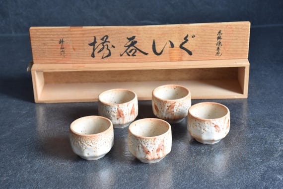 Set Of 5 Guinomi Sake Cups – Shino Ware Ceramic – with their original wooden storage box