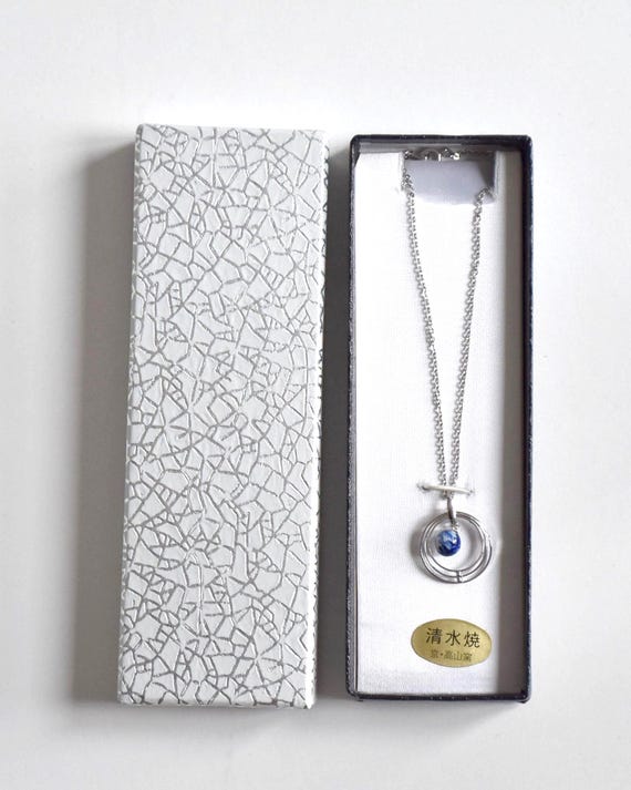 Kiyomizu-yaki Blue Floral Pendant Necklace displayed inside its original gift box
