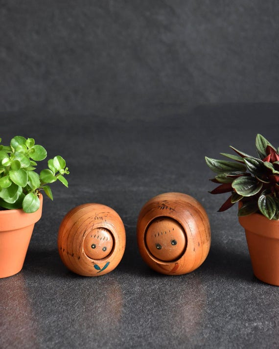 Creative Kokeshi Pair vintage wooden Japanese dolls with painted details and natural wood grain