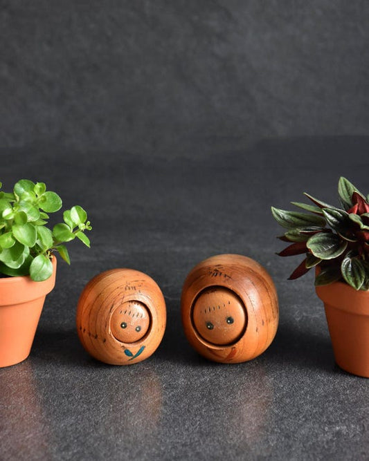 Creative Kokeshi Pair vintage wooden Japanese dolls with painted details and natural wood grain