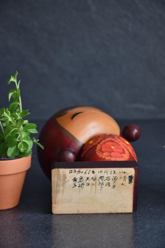 Chie Tamura Pigtail Kokeshi base with Japanese handwriting and date October 1986