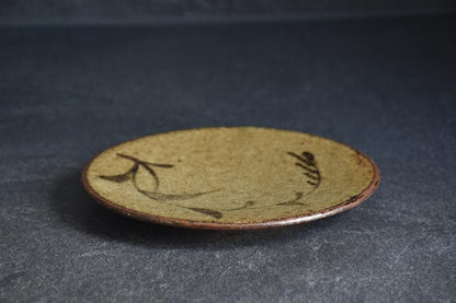 Karatsu-Yaki Botanical Plate low angle view highlighting the organic texture and flat surface