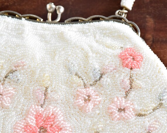 Japanese Floral Beaded Clutch Bag close-up showing the upper section of the white and rosa beadwork