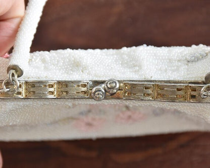 Japanese Floral Beaded Clutch Bag top view of the metal frame and classic kiss-lock clasp