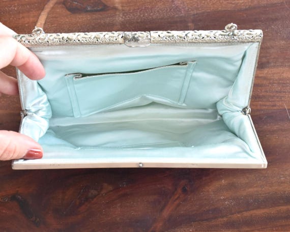 Japanese Blue Glass Bead Clutch showing the inside light blue lining and slip pockets