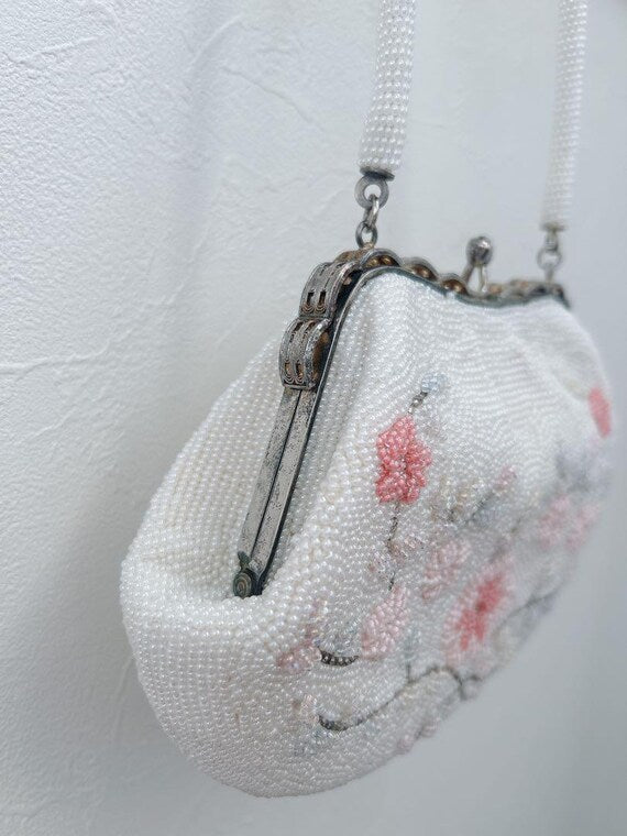 Japanese Floral Beaded Clutch Bag alternative angled side view showing the frame and handle attachment