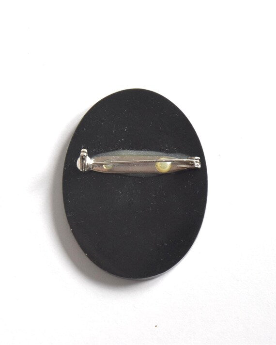 Raden shell inlay brooch showing metal clasp on the back