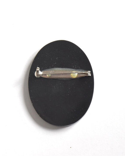 Raden shell inlay brooch showing metal clasp on the back