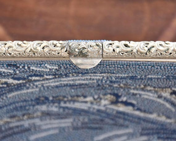 Japanese Blue Glass Bead Clutch showing a close-up of the ornate metal clasp