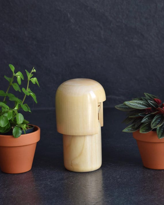 Tomio Ishida kokeshi doll viewed from a straight-on perspective