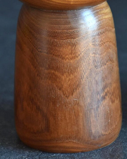 Kazuo Takamizawa kokeshi doll close up of the natural wood grain texture on the body
