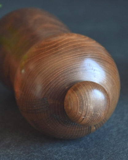 Kazuo Takamizawa kokeshi doll top view of the separate topknot mage and rounded head
