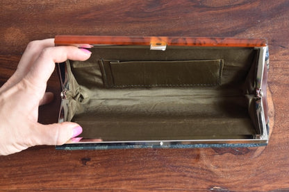 Amami Oshima Tsumugi kimono bag showing the open khaki interior with slip compartment