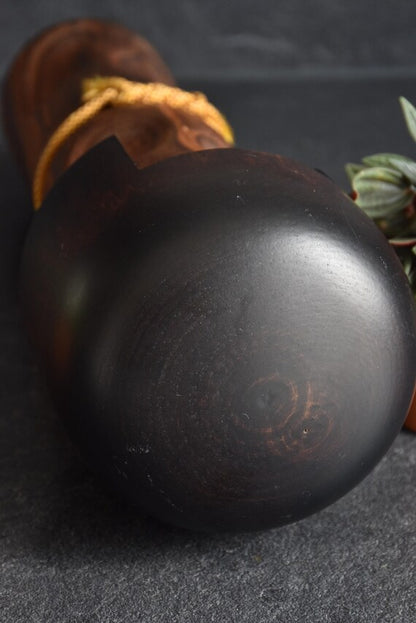 Usaburo Mori Kan Kokeshi Doll top of the dark wooden bob hairstyle