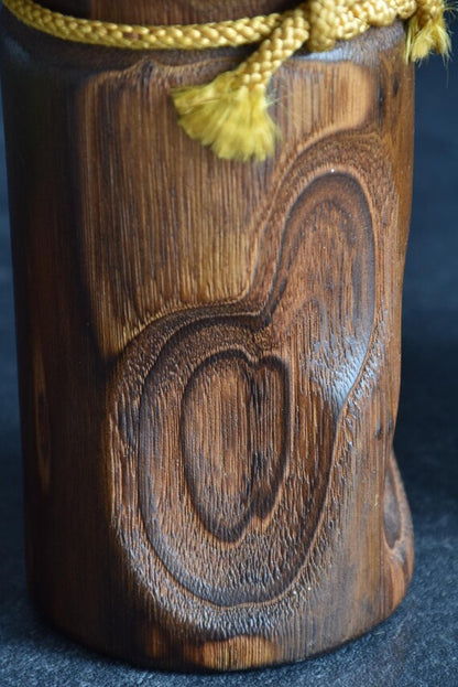 Usaburo Mori Kan Kokeshi Doll showing wood grain and carved pattern detail