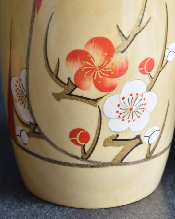 Kojo Tanaka Sosaku Kokeshi doll pattern detail of painted plum blossoms