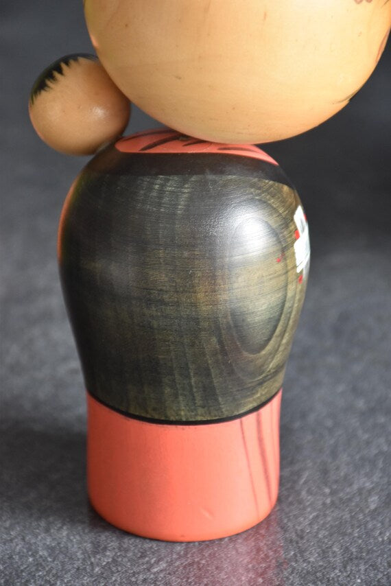 Hajime Miyashita Oshin Lullaby Kokeshi back view showing wood grain pattern
