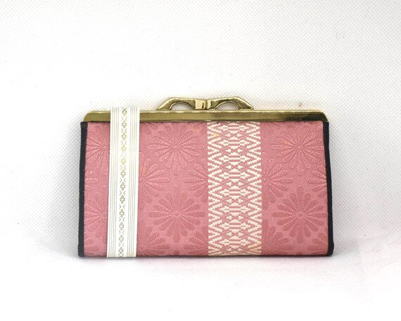 Hakata-Ori Silk Geometric Floral Wallet close up view of the textured brocade fabric