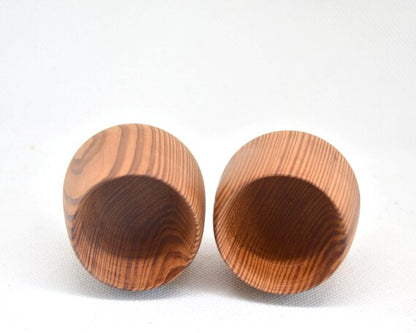 Yakusugi Cedar Sake Cups inside view showing the hollow wooden interior and natural grain