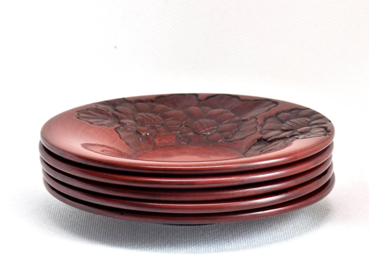 Kamakura-bori floral carved lacquerware plates set stacked view showing profiles