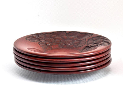 Kamakura-bori floral carved lacquerware plates set stacked view showing profiles
